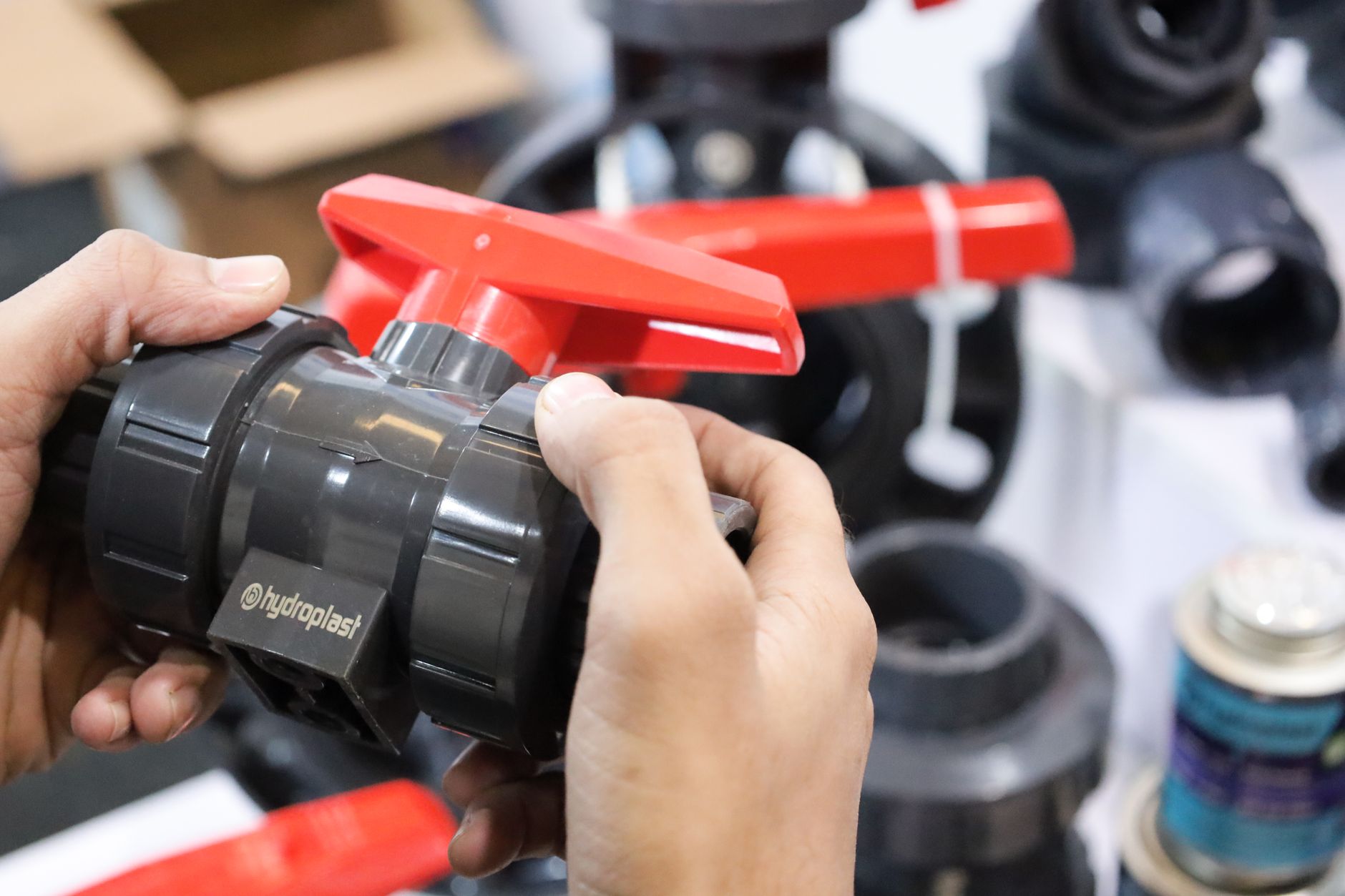 plumber inspecting home plumbing pipes