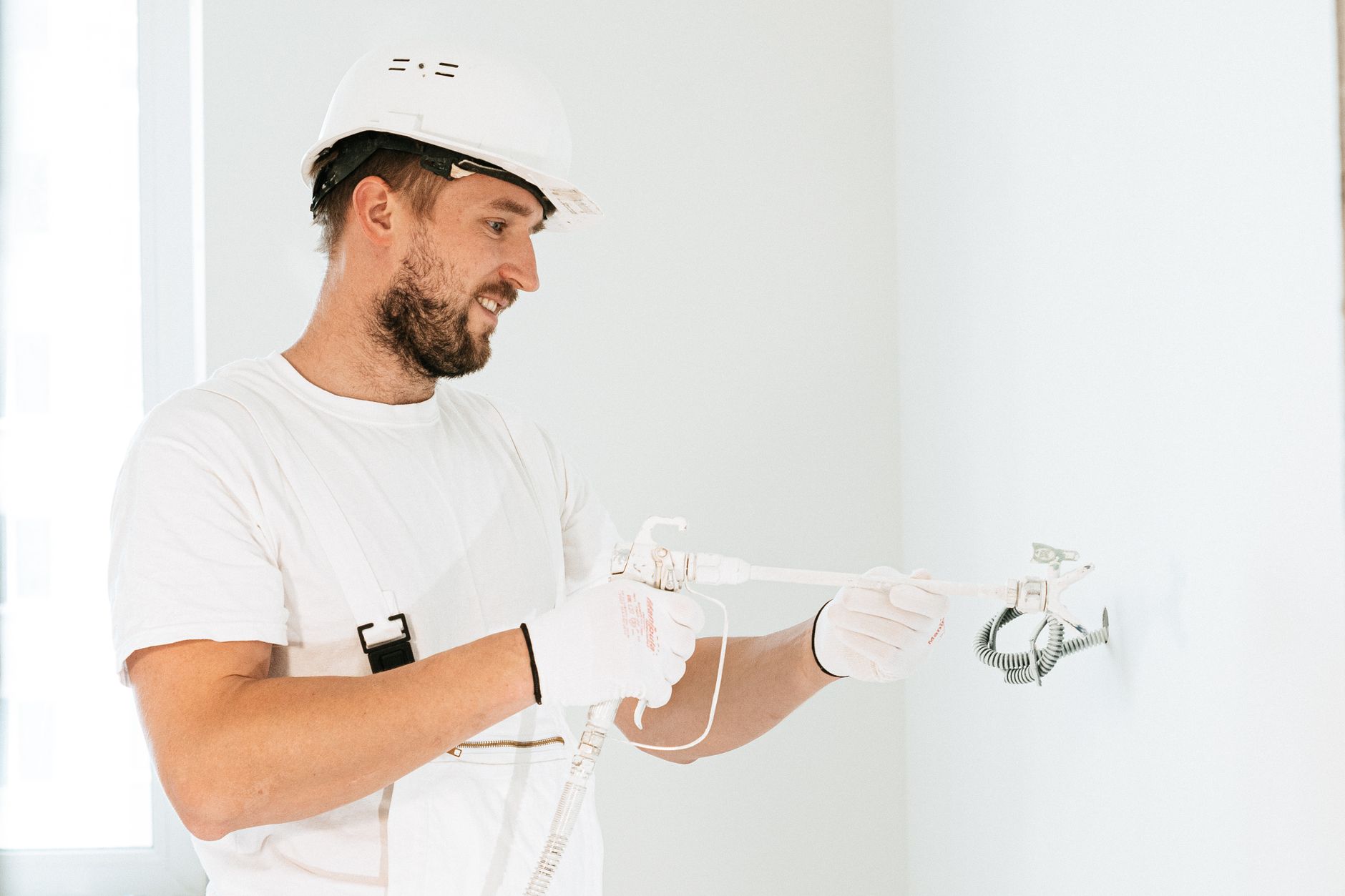 plumber installing tankless water heater